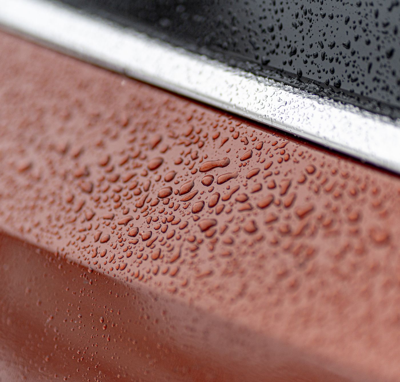Water tightly beading and shedding from protected automotive paint